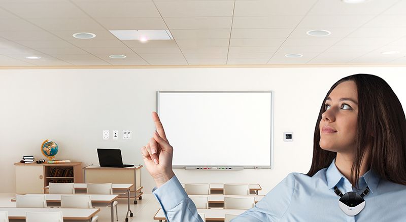 Classroom with ezRoom Alert-teacher pointing