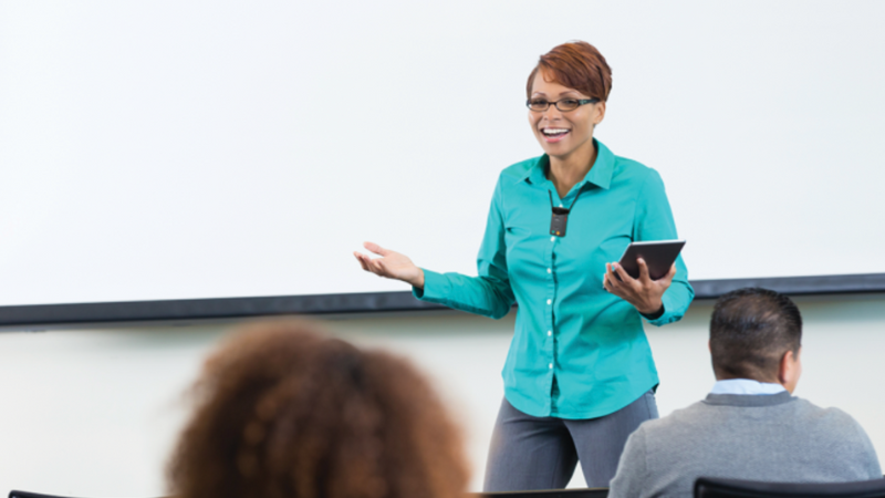 instructor using front row microphone necklace
