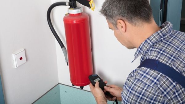 inspecting a fire exstinguisher-1